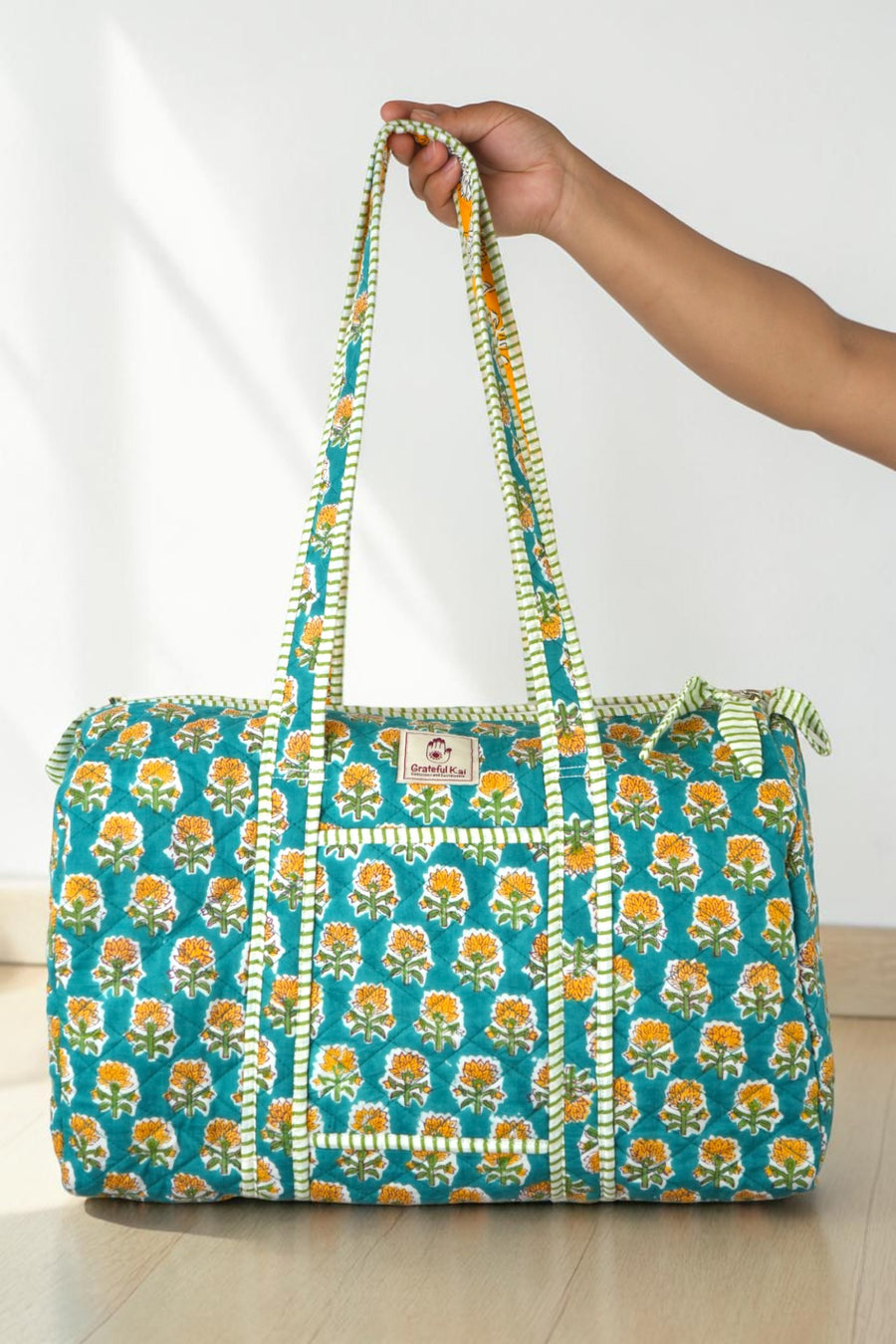 Quilted Duffle bag in Teal Tropicana