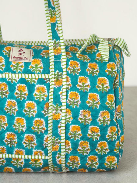 Quilted Duffle bag in Teal Tropicana