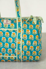 Quilted Duffle bag in Teal Tropicana
